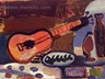 contemporary-modern-still-life-artists-jose-manuel-merello.-guitarra-espanola-y-espina-de-pescado.-oil